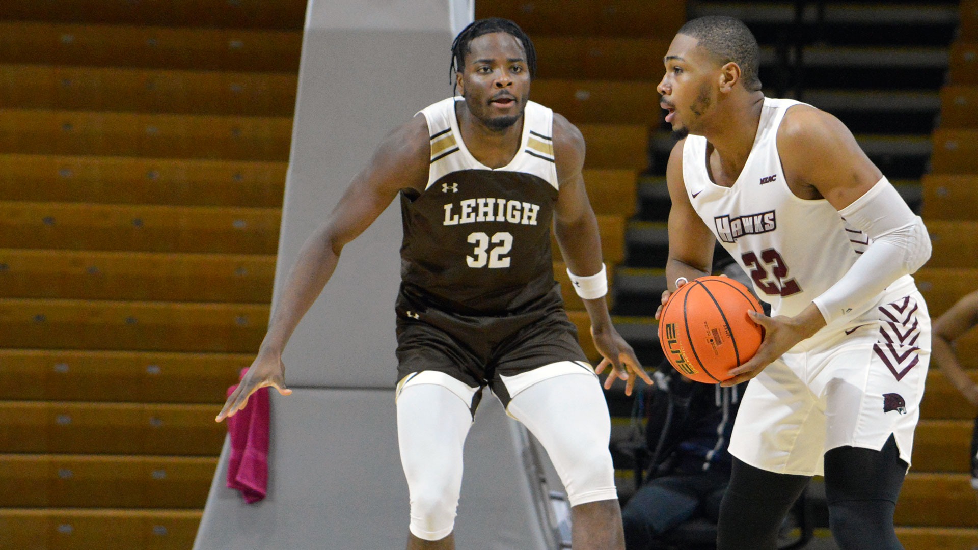 Henri Adiassa playing basketball at Lehigh University