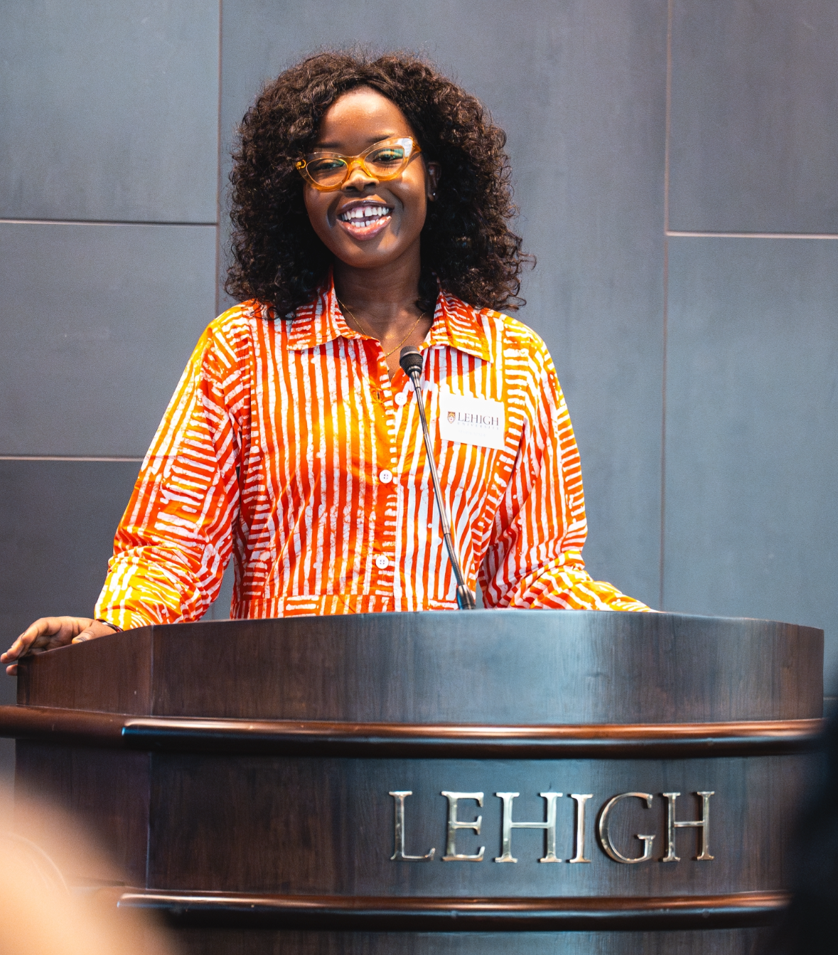 Marie Wade at a Lehigh University podium