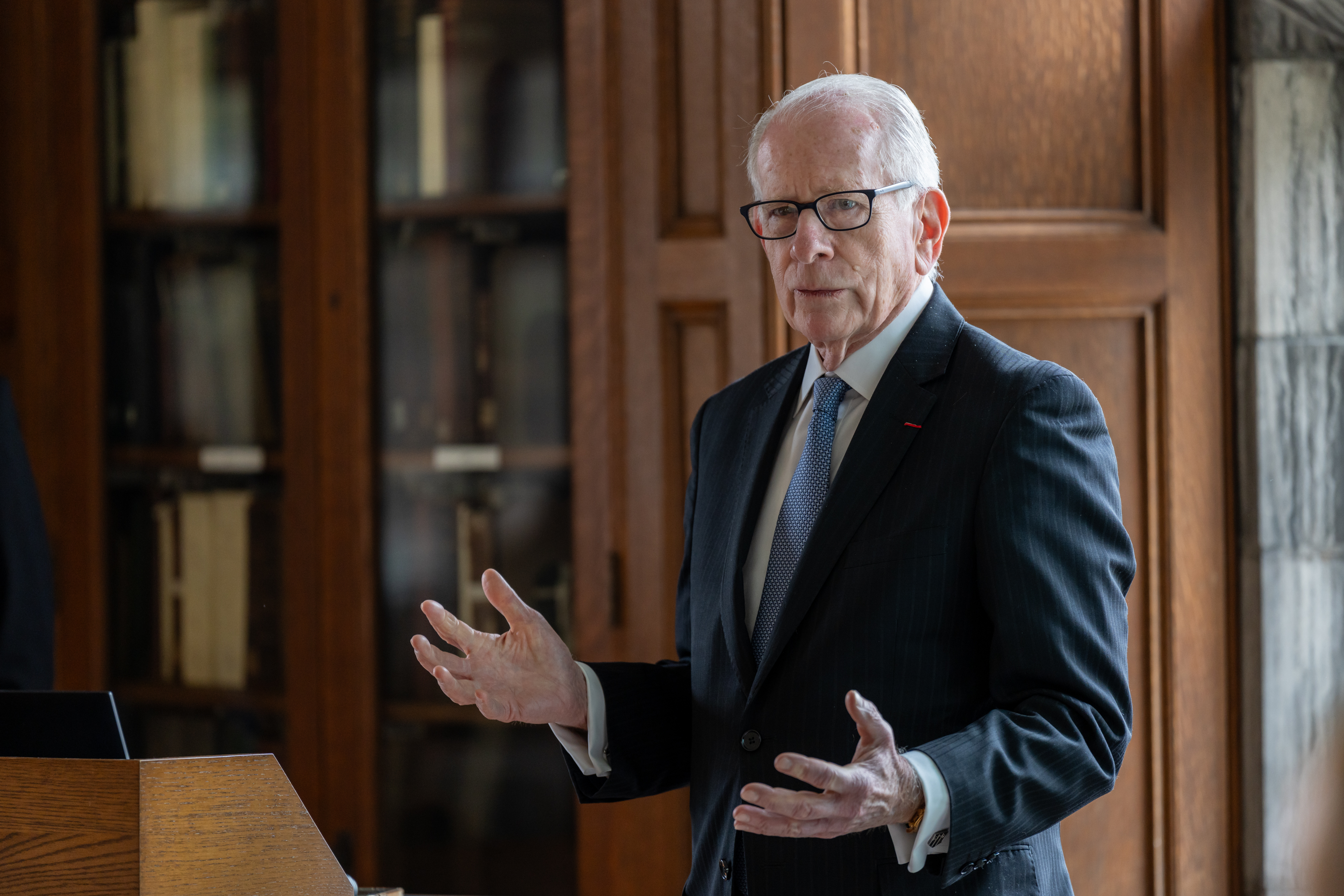 Allan Goodman speaking at a podium at Lehigh University