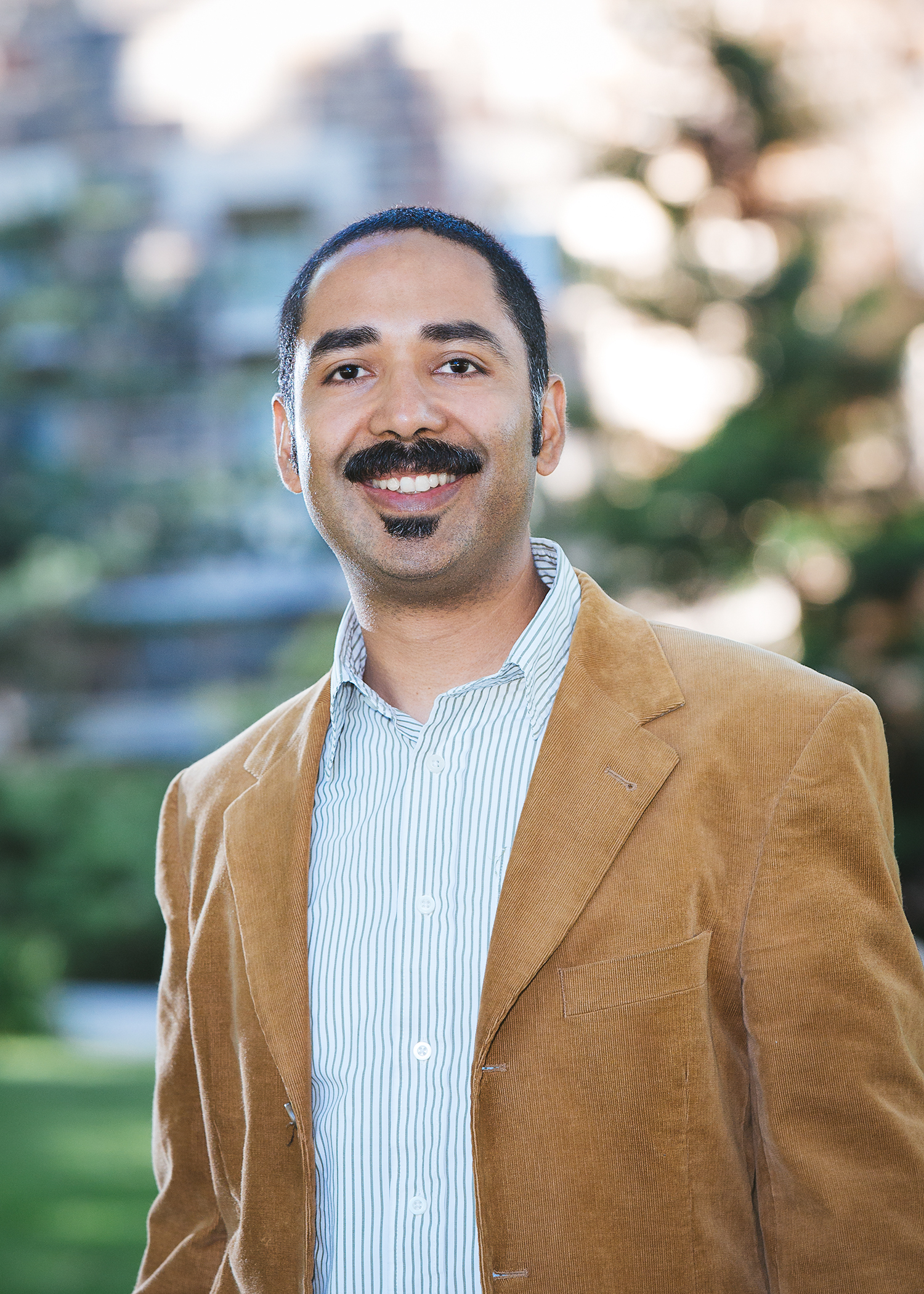 A photo of Hugo Ceron-Anaya smiling at the camera