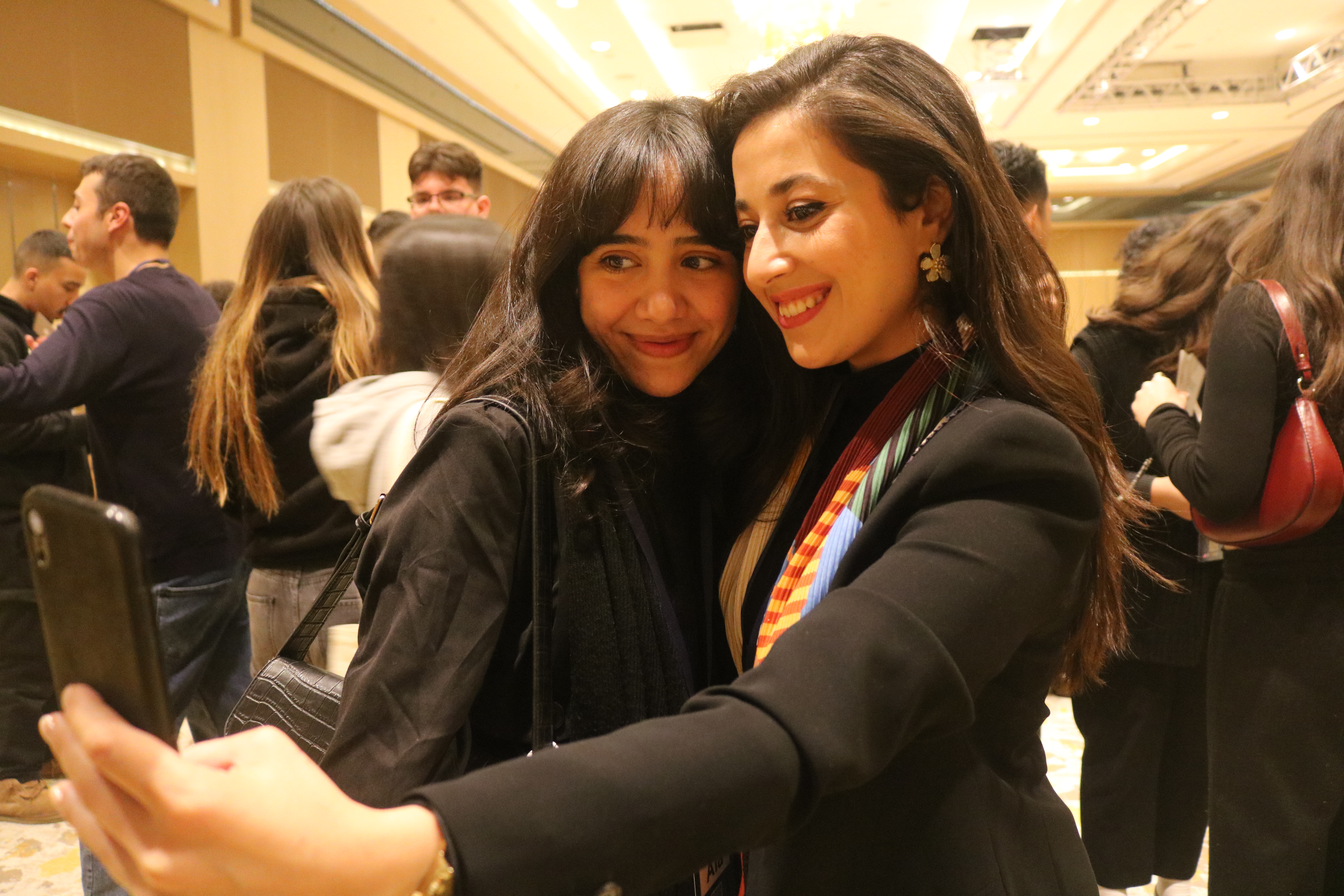 Two young women posing for a selfie