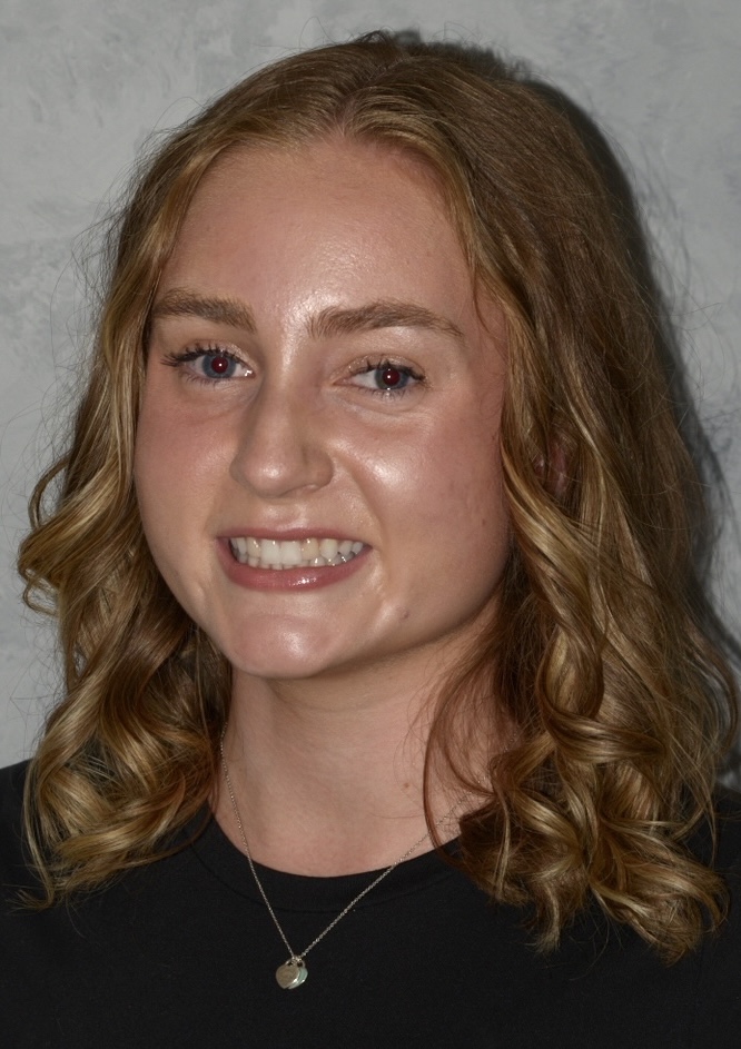 A headshot of Alex Azzara