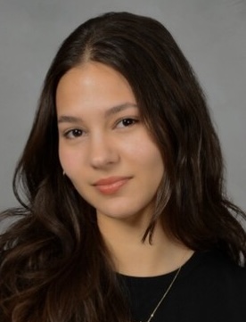 A headshto of Alina Barreto