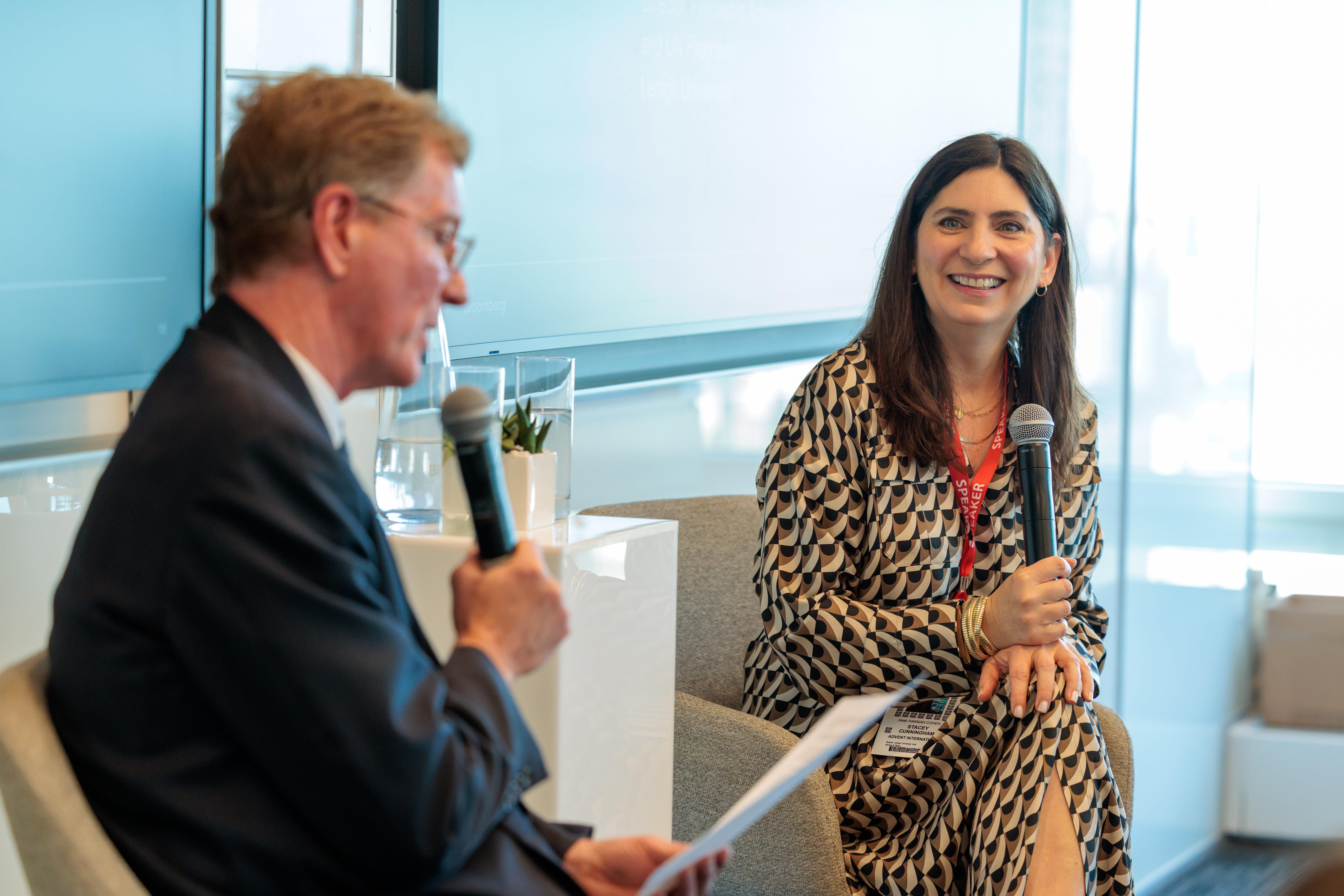 A man interviews a woman at Bloomberg Tower