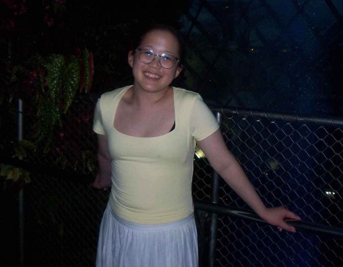 A young woman smiling for the camera