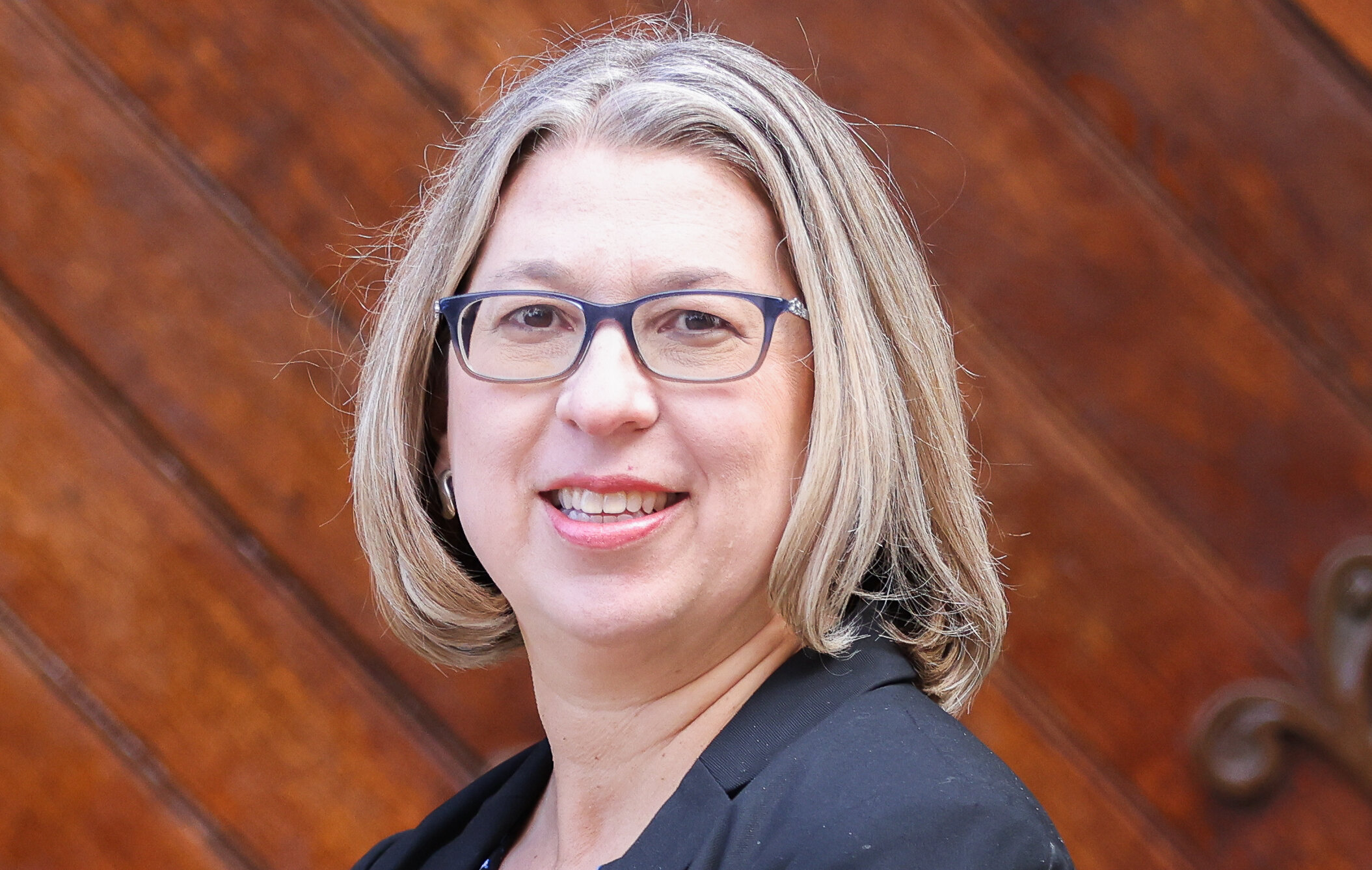 A headshot of Leah Mason