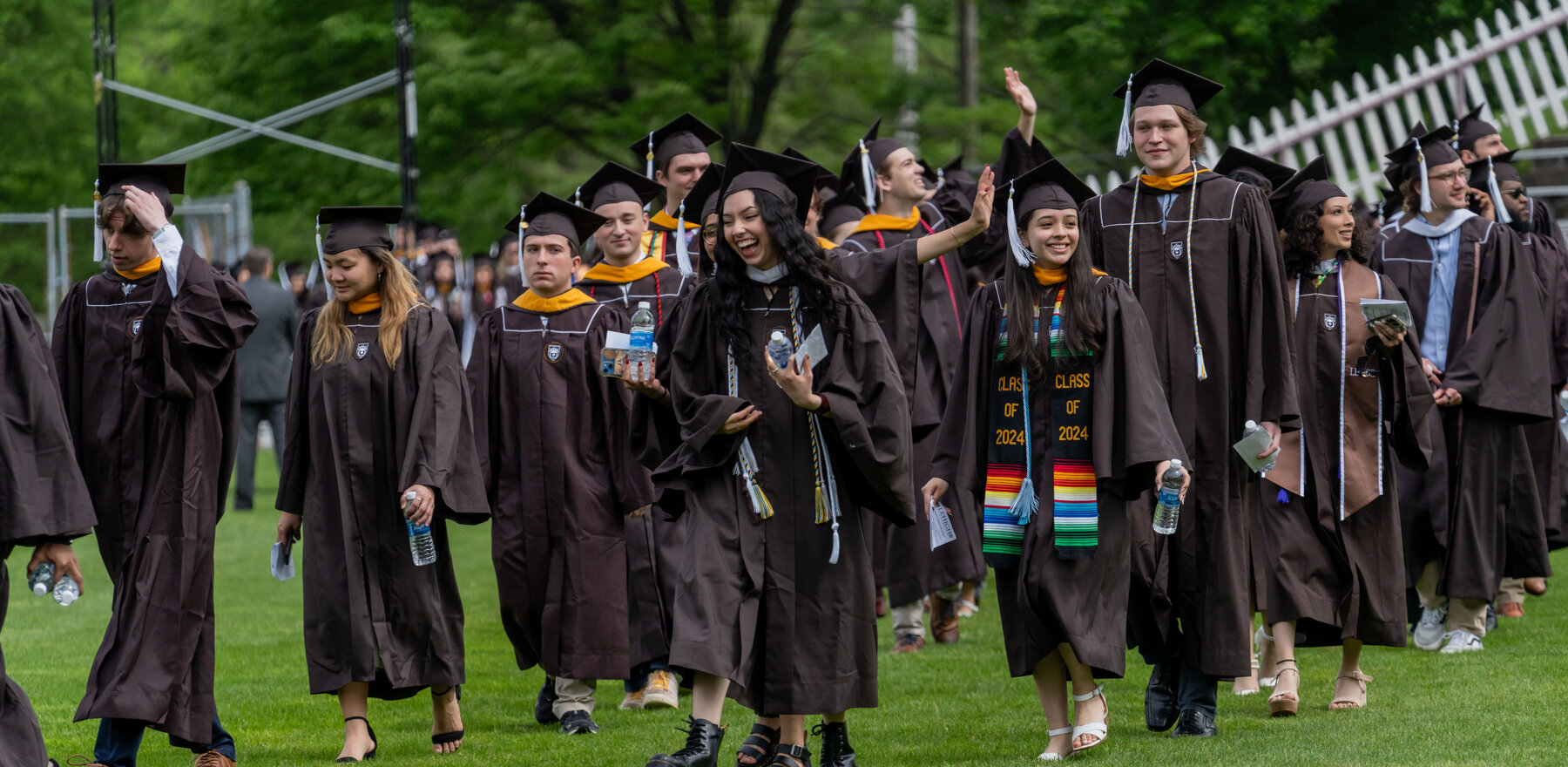 Students walking outside during a Lehigh University graduation ceremony