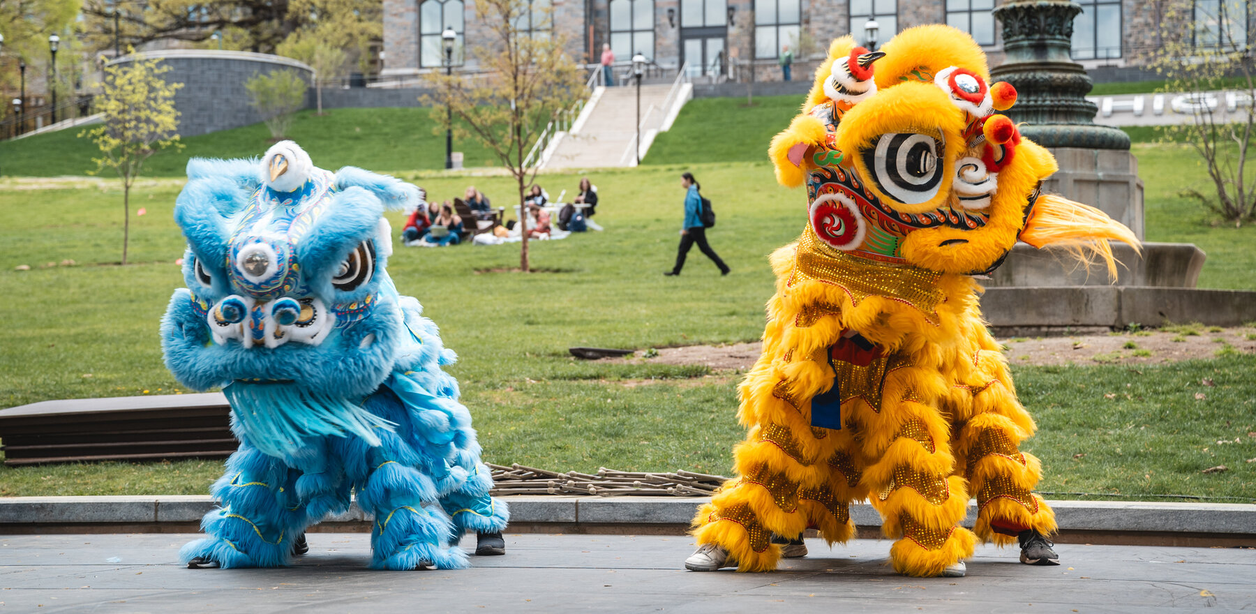 Two dragon costumes at a dance performance