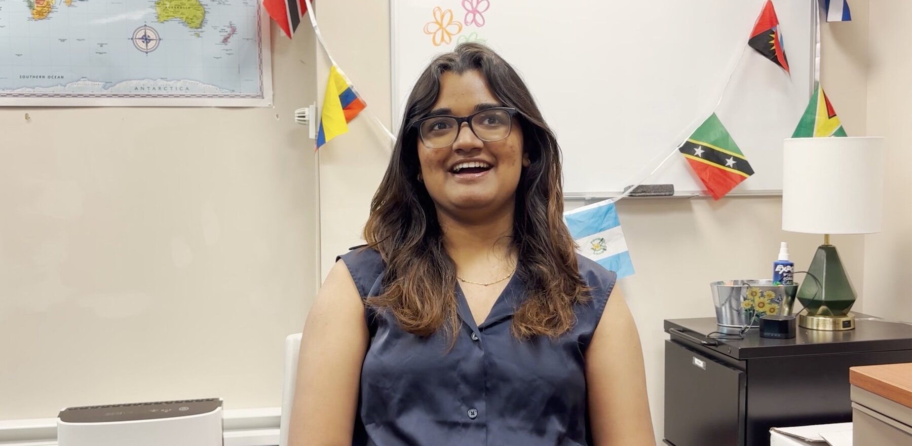 Akanksha Gavade smiling while talking directly to the camera