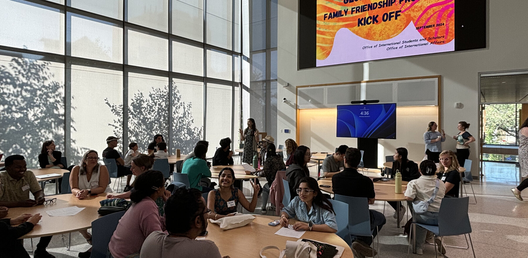 Lehigh University students, faculty, and staff gathered at tables in a large room