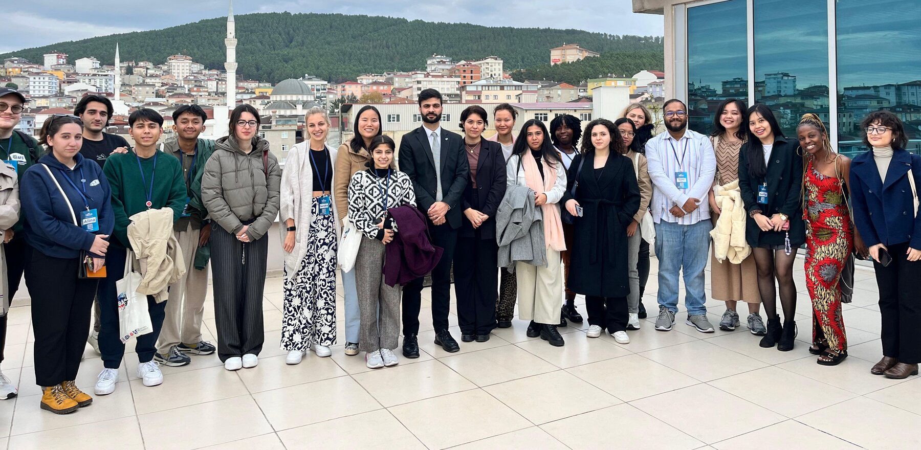 A large group assembled outside for a picture in Istanbul