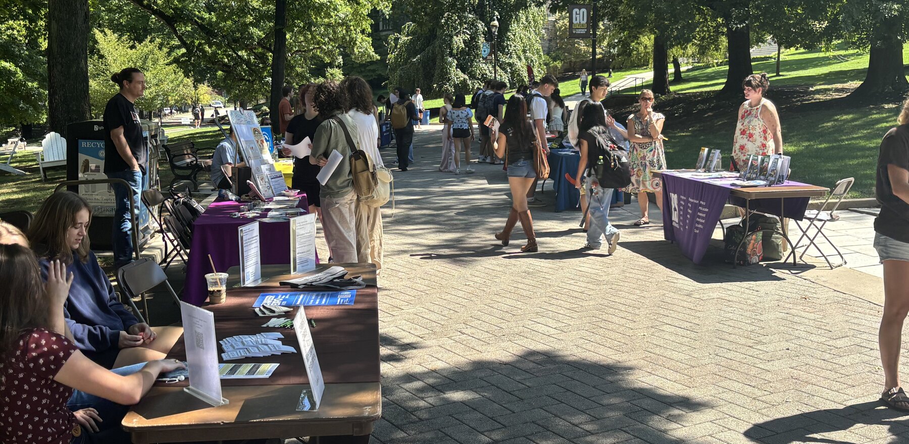 Several students at a study abroad fair outside