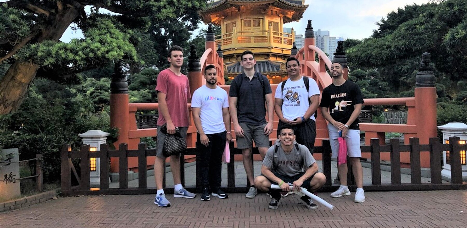 A group of six college students posing for a photo in Hong Kong