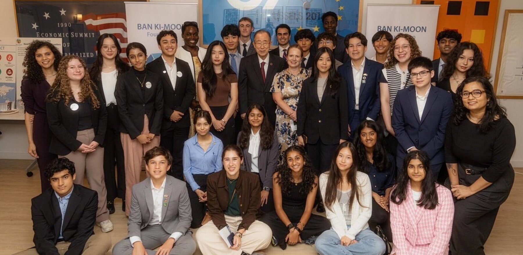 A group of people standing together posing for a photo