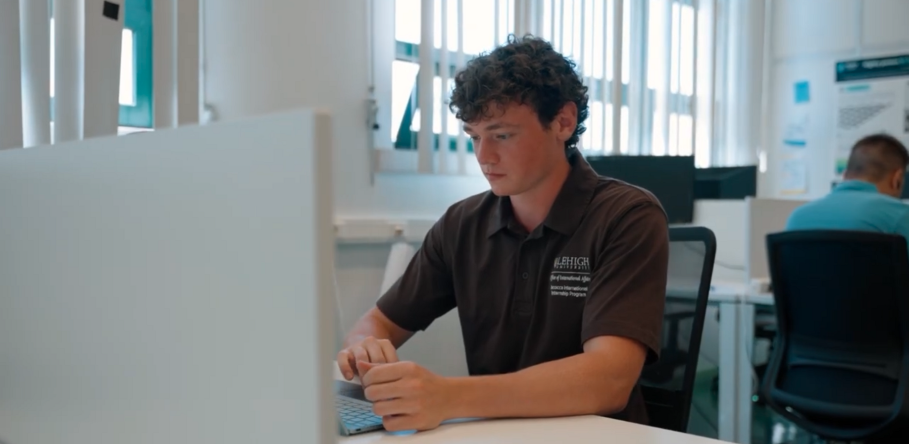 A lehigh student sitting at a computer