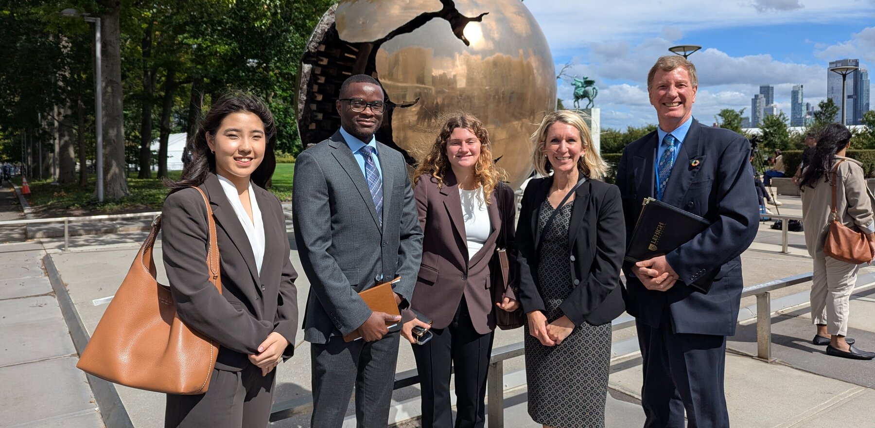 Five people at the United Nations headquarters in New York City