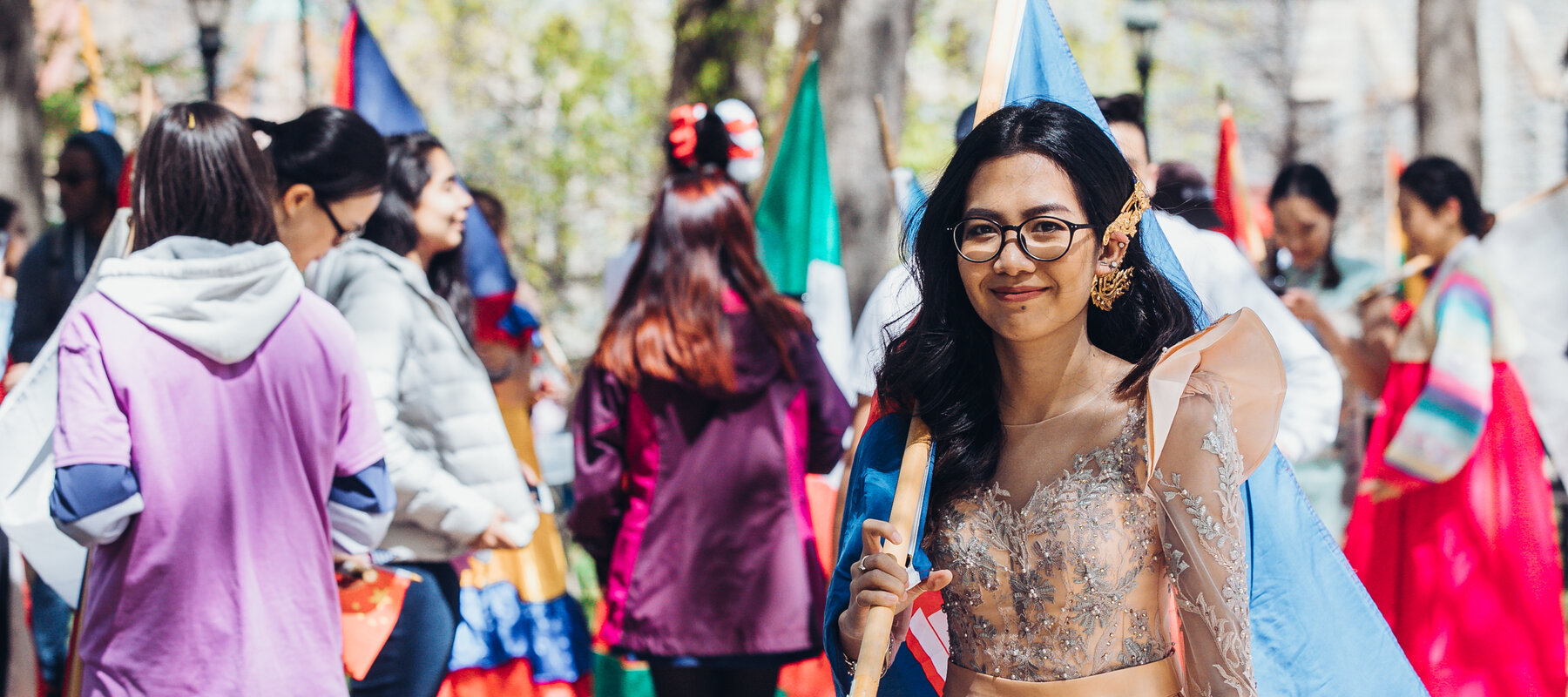 International student with flag at the Lehigh University International Bazaar