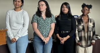 Four Lehigh University students standing in a row