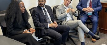 Four people speaking at a networking session