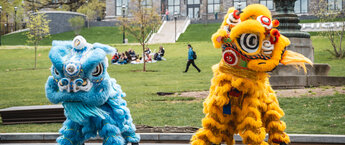 Two dragon costumes at a dance performance