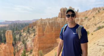 David Morency standing along a canyon