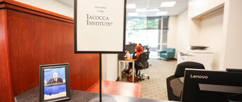 A sign in an office welcoming visitors to the Iacocca Institute