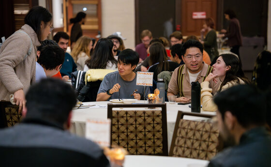 People eating in a hall