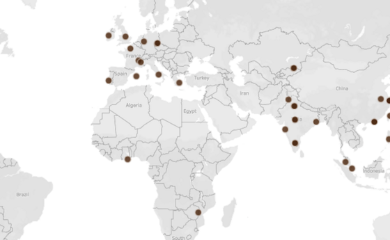 A world map with pinpoints in it