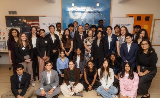 A group of people standing together posing for a photo