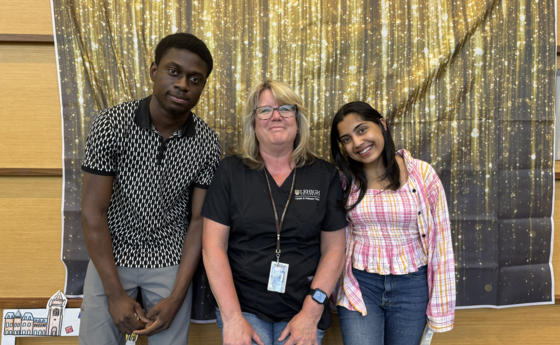 Three  people posing for a photo