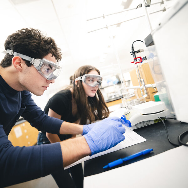 Two young people working in a laboratory
