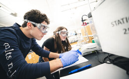 Two young people working in a laboratory