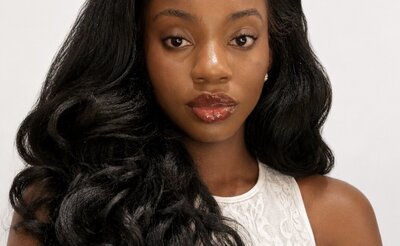 Headshot of Rebecca Kayembe