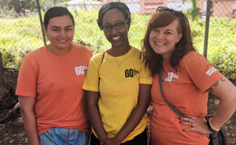 Chelsea Gilbert with students in Antigua