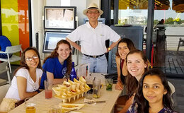 Daniel Ou-Yang (standing) with student research interns in Bordeaux.